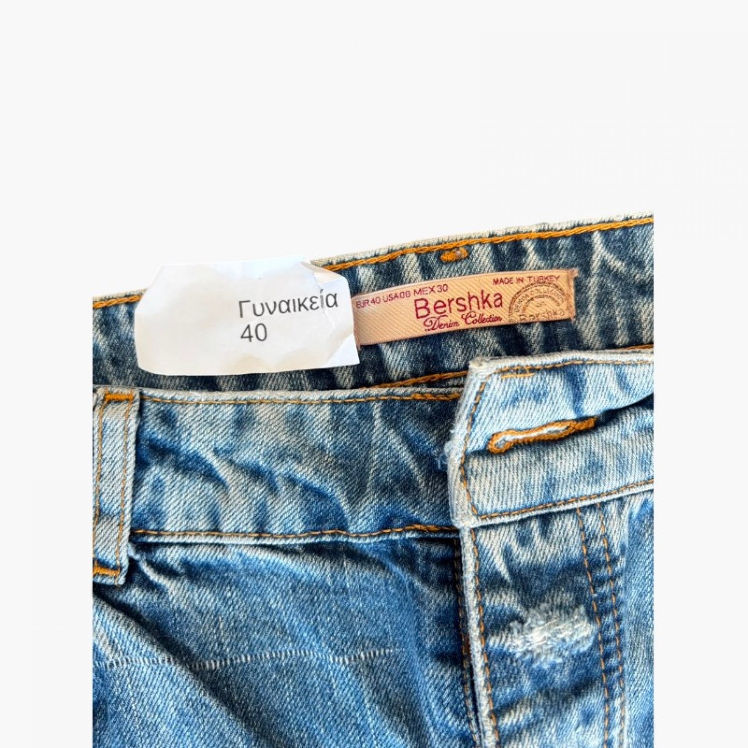 Bershka τζιν παντελόνι με σκισίματα ανοιχτό μπλε — 40